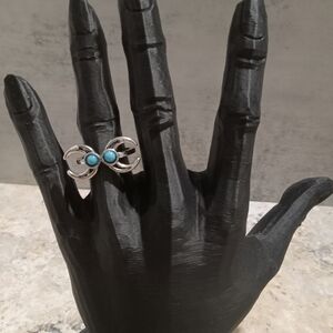 Elegant Silver Ring with Blue Accents